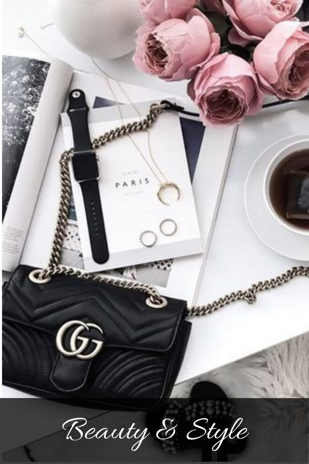 Flat lay with Black Gucci Handbag Apple Watch and Pink roses.jpg